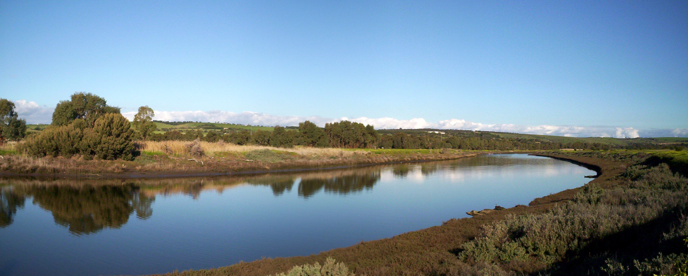 Still water and reflections along the winding Onkaparinga River estuary